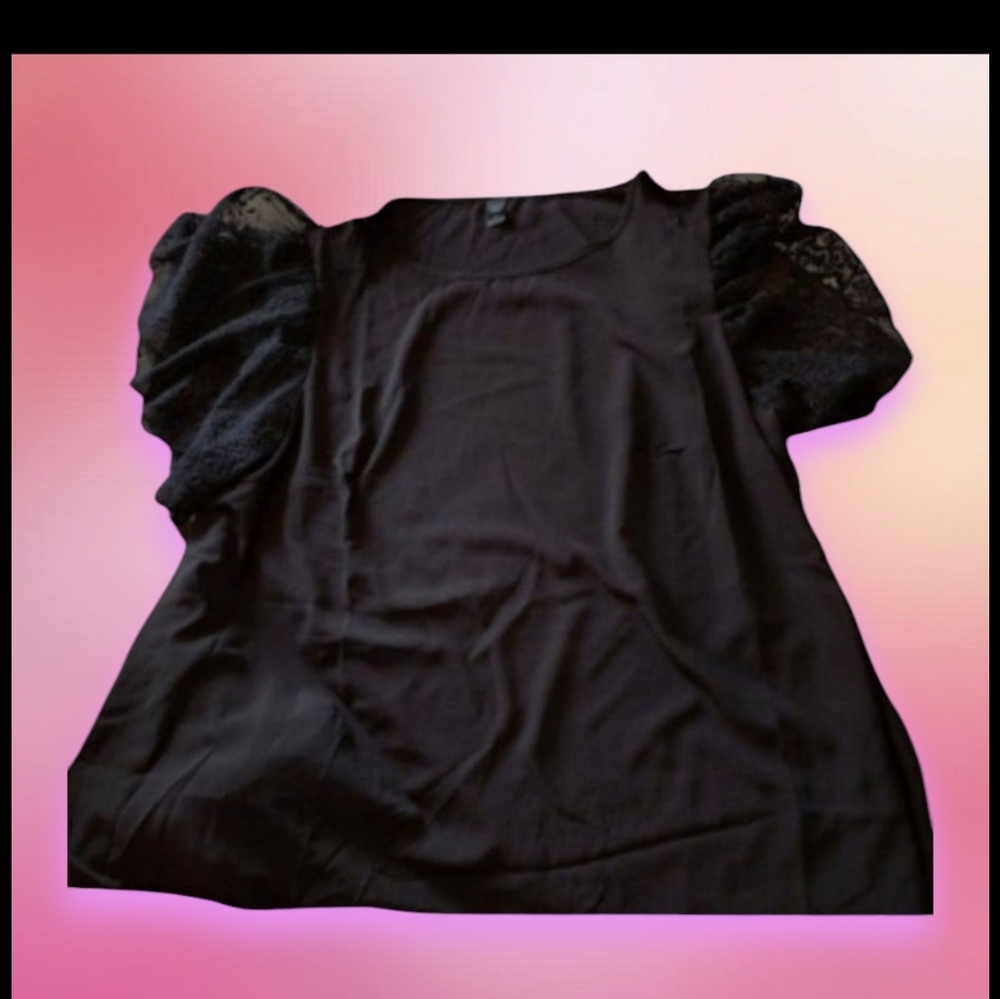 Plus size black top with lacy sleeves